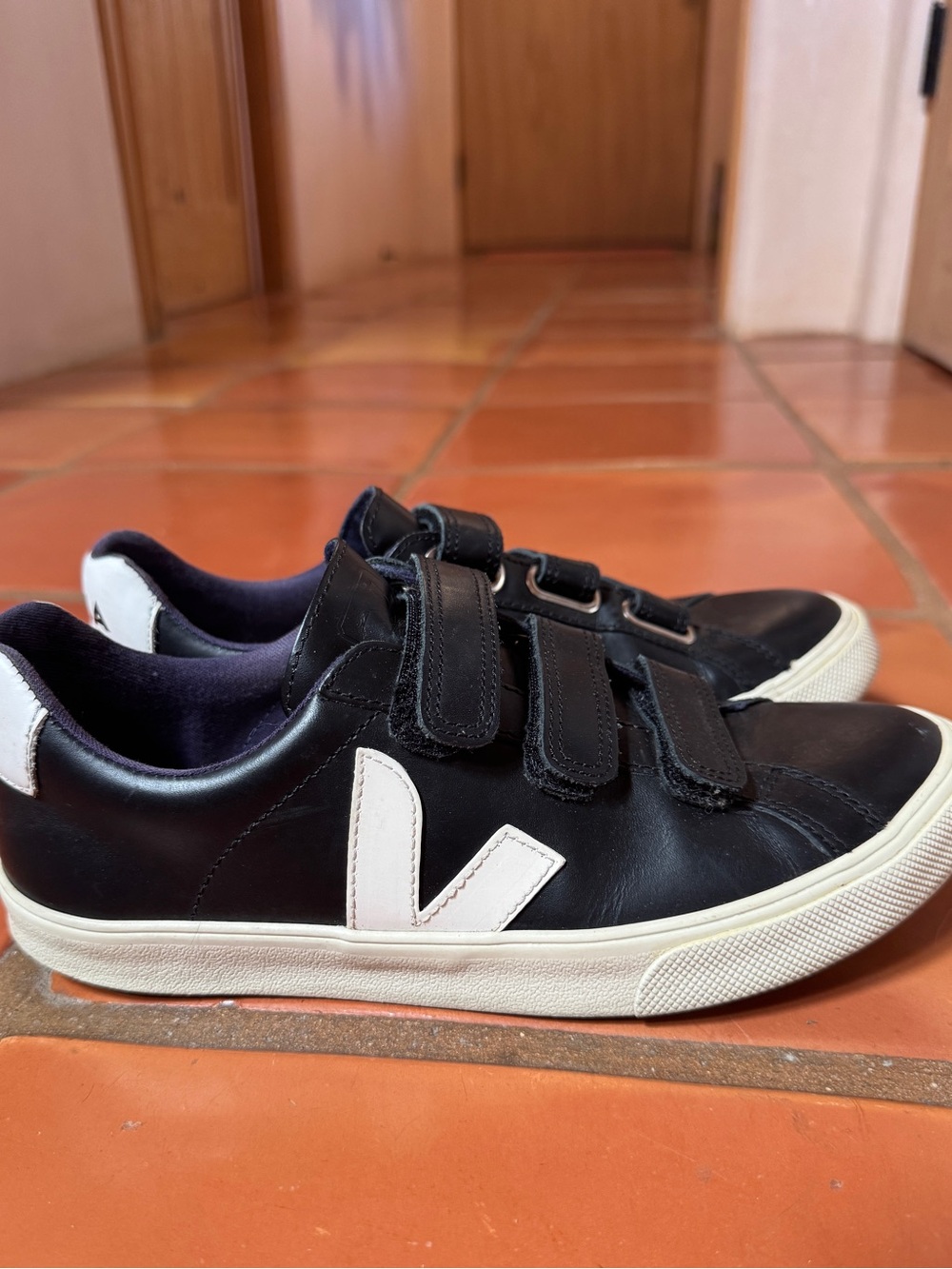 Veja Women’s Black Leather Sneakers with White V Logo